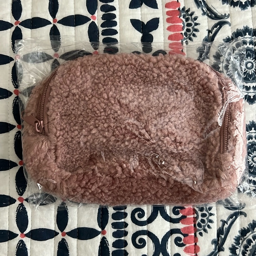 NWOT Light pink fleece belt bag